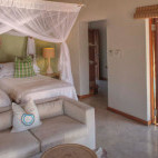Beach villa bedroom at Azura Benguerra in Mozambique