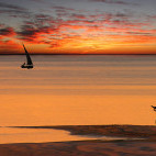 Fisherman at sunset in Vilaculos, Mozambique
