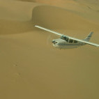 Aircraft flying over the Namibian desert