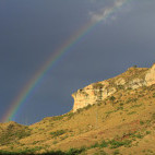 Rainbow behind Golden Gate Highlands National Park in South Africa.