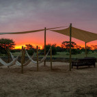 Hammocks at sunset. Kalahari Tented Camp, South Africa