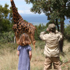 Giraffe & tourists in South Africa.