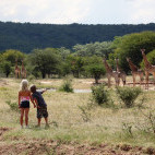 Siblings on a family safari in South Africa.