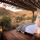 Day bed and evening star-bed at Tarkuni Lodge in Tsawlu Private Game Reserve, South Africa.