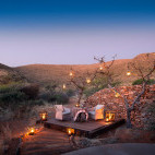 Outdoor dining at Tarkuni Lodge in Tsawlu Private Game Reserve, South Africa.