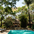 Swimming pool at Rivertrees Country Inn in Arusha, Tanzania