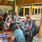 Nick Mackman running a sculpture workshop in Tanzania.