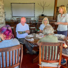 Nick Mackman running a sculpture workshop in Tanzania.