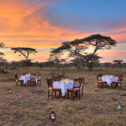 Outdoor dining at Ndutu Safari Lodge in Tanzania.