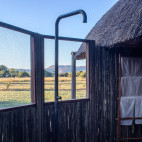 Outdoor showers at Kuyenda Bushcamp in South Luangwa National Park, Zambia