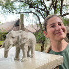Client with elephant sculpture on our Wildlife Art Safari in South Luangwa, Zambia
