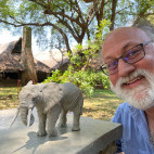 Client with elephant sculpture on our Wildlife Art Safari in South Luangwa, Zambia