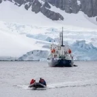 The Polar Athena by Petermann Island, in the Antarctic.