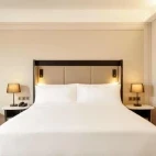 A deluxe riverside room king bed at Hilton Kuching, Borneo