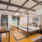 A bedroom at Camp Tigerlily, India.