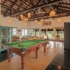 The lounge area with pool table, at Camp Tigerlily, India.
