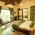 A bedroom at Chitvan Jungle Lodge, India