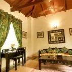 Bedroom seating area at Chitvan Jungle Lodge, India