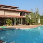 The pool area at Chitvan Jungle Lodge, India