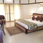 A bedroom at Infinity Resort Kaziranga, India