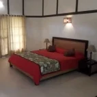 A bedroom at Infinity Resort Kaziranga, India