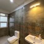 A bathroom area at Shikhar Tarry Lodge, India