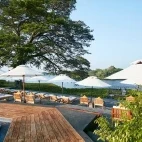 Sun loungers around the pool at EKHO Safari Tissa, Sri Lanka