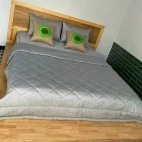 View of the double bed set-up at Cat Tien National Park Bungalows.