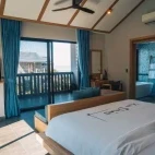 View of a double bedroom in a lagoon view pool villa, at Vedana Lagoon Resort, Vietnam.