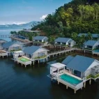 External view of the waterside pool villas at Vedana Lagoon Resort, Vietnam.