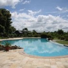 Swimming pool at Aahana Resort in Jim Corbett National Park, India