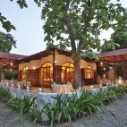 Outdoor dining area at Jaagir Lodge in Dudhwa National Park