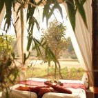 Outdoor bed at Flame of the Forest in Kanha National Park, India