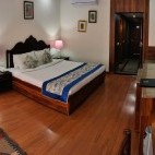 Deluxe bedroom at Udai Vilas Palace in India