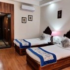 Twin bedroom at Udai Vilas Palace in India