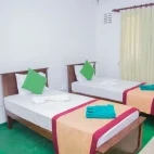 Twin bedroom at Blue Magpie Lodge in Sri Lanka