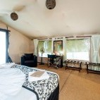 Double bedroom inside one of the tents at Leopard Trails Camp in Sri Lanka