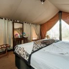 Double bedroom inside one of the tents at Leopard Trails Camp in Sri Lanka