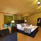 Double bedroom inside one of the tents at Leopard Trails Camp in Sri Lanka