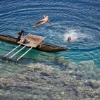 Boys jumping from a platform in Tufi, Papua New Guinea.