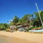 Exterior view of Reef Resort from the beach.