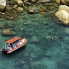 Snorkellers off of Orpheus Island, Queensland, Australia.