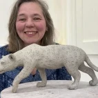 Client with their completed sculpture.