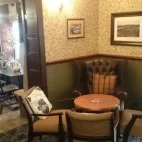 Seating by the fire at The Silverdale Hotel, Lancashire