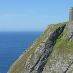 View of the American monument on the cliff at Mull of Oa, Scotland.