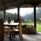 Outdoor seating area at Arkan Han in Trigrad, Bulgaria