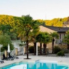 Swimming pool and river at Les Magnolias, The Dordogne