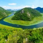 Green pyramid and bend of Rijeka Crnojevica River in Montenegro