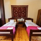 Twin bedroom at Dwór Dobarz in Biebrza Marshes, Poland