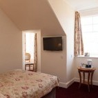 Bedroom at Grant Arms Hotel in Grantown-on-Spey, Scotland.